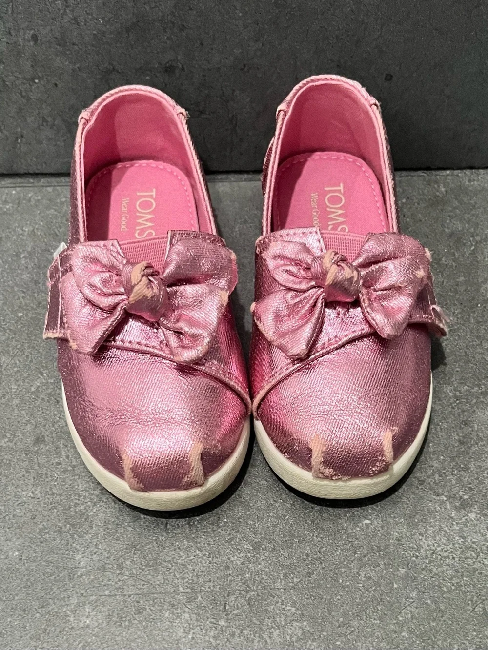 TOMS Kids Metallic Rose Pink Bow Alpargata shoe